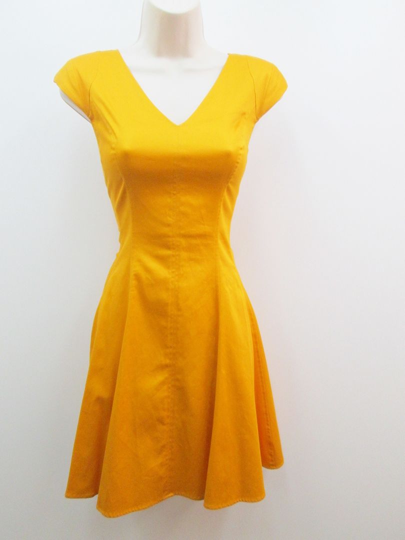 ... Simpson Radiant Yellow Cotton Fit And Flare Cap Sleeve Cocktail Dress